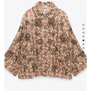 Embroidered sequin blouse.